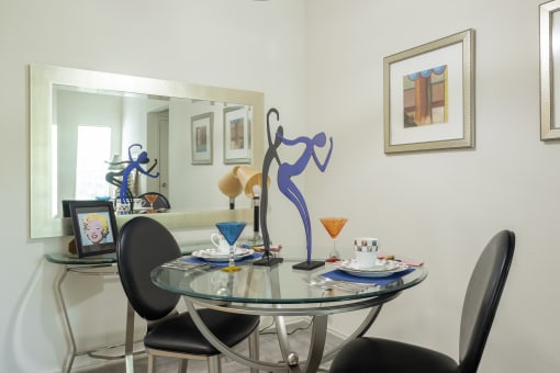 A dining table at Hawthorne Apartment Homes set for a meal, with a cozy and inviting atmosphere.
